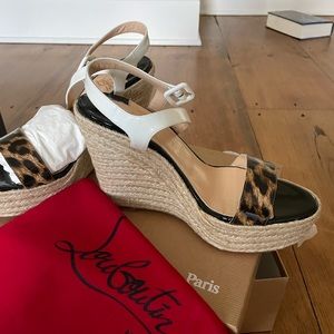 Christian Louboutin wedges. Worn once! These are comfortable shoes!